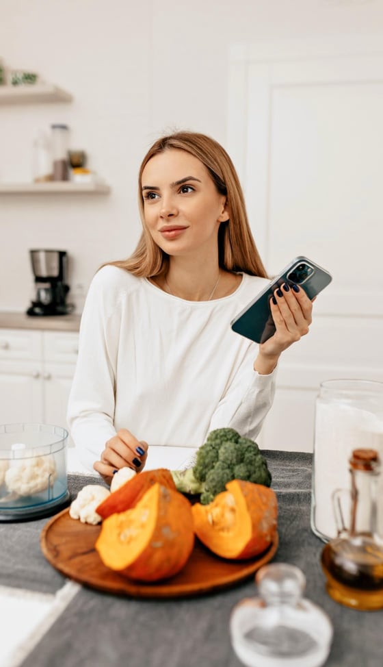 A client preparing a carefully planned meal at home